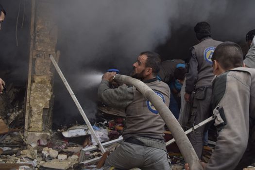 SYRIA, Duma: [WARNING: graphic images]  Warplanes target one of the main streets in the city of Duma, in the eastern Damascus region on November 7, 2015.  At least 10 people have been killed while dozens of people are wounded. 