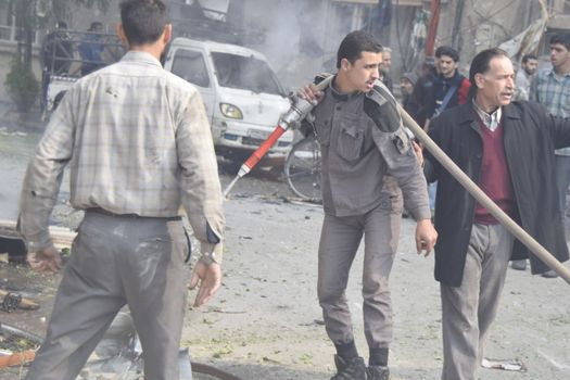 SYRIA, Duma: [WARNING: graphic images]  Warplanes target one of the main streets in the city of Duma, in the eastern Damascus region on November 7, 2015.  At least 10 people have been killed while dozens of people are wounded. 