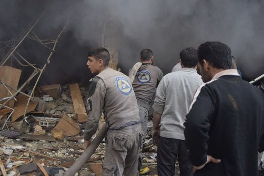 SYRIA, Duma: [WARNING: graphic images]  Warplanes target one of the main streets in the city of Duma, in the eastern Damascus region on November 7, 2015.  At least 10 people have been killed while dozens of people are wounded. 