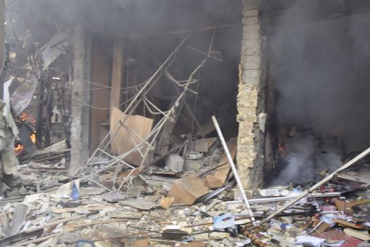 SYRIA, Duma: [WARNING: graphic images]  Warplanes target one of the main streets in the city of Duma, in the eastern Damascus region on November 7, 2015.  At least 10 people have been killed while dozens of people are wounded. 