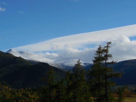 view of the tops of the mountains on the way to Multinskiye lake in the Altai Republic. Altai Mountains, taiga.