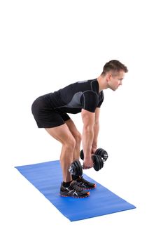 Young man shows starting position of Standing Bent Over Dumbbells Row workout, isolated on white