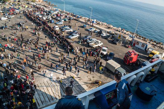 GREECE, Mytilene: Refugees wait to depart from Mytilene, the capital and port city of the Greek island of Lesbos, on November 7, 2015. From there, thousands of refugees will make their way to the Port of Piraeus.