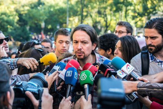 SPAIN, Madrid: Pablo Iglesias, leader of the Podemos Party, addresses the press as thousands of protesters from across Spain march through Madrid on November 7, 2015 in a rally against gender violence. In Spain, more than 1,390 women have reportedly been murdered by male attackers since 1995; this year, 84 cases involving the murder of women by men have been reported thus far. 