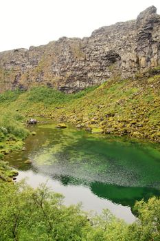 Beautiful lake with green water in Iceland