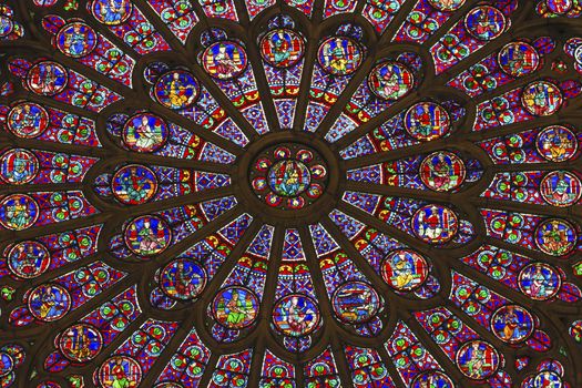 North Rose Window Virgin Mary Jesus Disciples Stained Glass Notre Dame Cathedral Paris France.  Notre Dame was built between 1163 and 1250 AD.  Virgin Mary Rose Window oldest in Notre Dame from 1250.