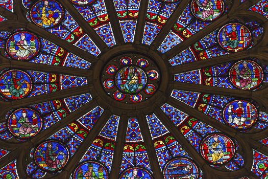 North Rose Window Virgin Mary Jesus Disciples Stained Glass Notre Dame Cathedral Paris France.  Notre Dame was built between 1163 and 1250 AD.  Virgin Mary Rose Window oldest in Notre Dame from 1250.