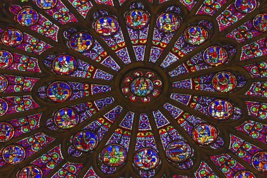 North Rose Window Virgin Mary Jesus Disciples Stained Glass Notre Dame Cathedral Paris France.  Notre Dame was built between 1163 and 1250 AD.  Virgin Mary Rose Window oldest in Notre Dame from 1250.