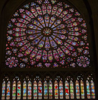 North Rose Window Virgin Mary Jesus Disciples Stained Glass Notre Dame Cathedral Paris France.  Notre Dame was built between 1163 and 1250 AD.  Virgin Mary Rose Window oldest in Notre Dame from 1250.