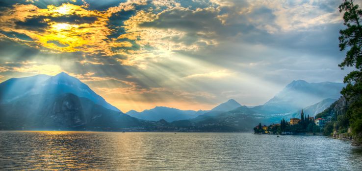 Romantic sunset in town Varenna on Como lake of Lombardy