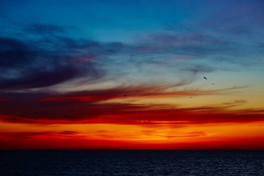 Sunset over the ocean. sunset at coast of the sea