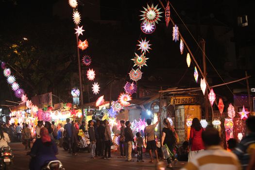 Pune, India - November 7, 2015: People in India shopping for sky lanterns on the occasion of Diwali festival in India