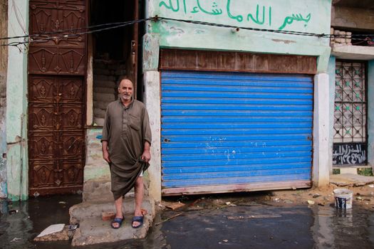 EGYPT, Alexandria: People are seen in the flooding road after a torrential rain caused flood in the Kafr El Arab neigborhood in west of Alexandria, Egypt on November 07, 2015.