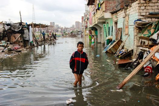 EGYPT, Alexandria: People are seen in the flooding road after a torrential rain caused flood in the Kafr El Arab neigborhood in west of Alexandria, Egypt on November 07, 2015.