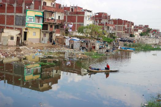 EGYPT, Alexandria: People are seen in the flooding road after a torrential rain caused flood in the Kafr El Arab neigborhood in west of Alexandria, Egypt on November 07, 2015.