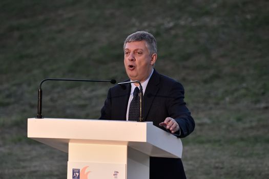 GREECE, Athens: Kostas Panagopoulos, President of the Greek sports federation SEGAS, speaks during the Ceremony of the Lighting of the Marathon Flame at the Marathon Tomb in Athens, Greece, on November 7, 2015.