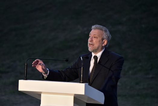GREECE, Athens: Deputy Minister for Sport Stavros Kontonis  speaks during the Ceremony of the Lighting of the Marathon Flame at the Marathon Tomb in Athens, Greece, on November 7, 2015.