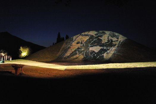 GREECE, Athens: Ancient Greek scenes are projected onto the Marathon Tomb during the Ceremony of the Lighting of the Marathon Flame at the Marathon Tomb in Athens, Greece, on November 7, 2015.