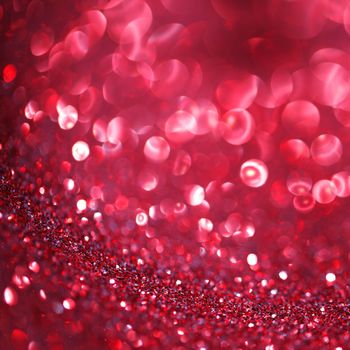 Abstract red shiny glitter bokeh christmas background