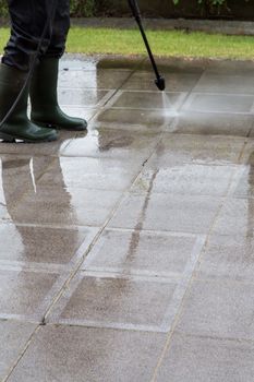 Outdoor floor cleaning with high pressure water jet