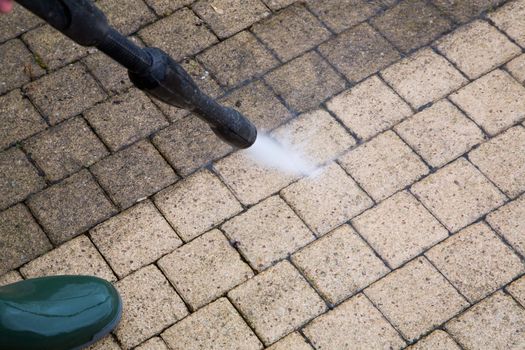 Outdoor floor cleaning with high pressure water jet