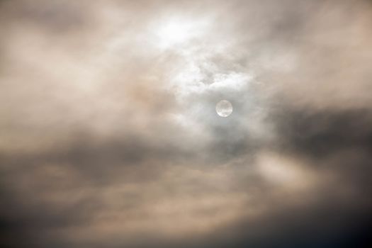 Dark sky before the rain and the moon