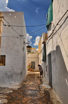 HAMMAMET, TUNISIA - OCT 2014: Narrow street of ancient Medina on October 6, 2014 in Hammamet, Tunisia