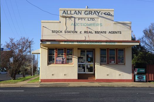 GOOLOOGONG, AUSTRALIA - SEPTEMBER 19, 2015;  One of the unique old buildings to be found in the outback township of Gooloogong. stock station and real estate agent and auctioneer