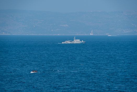 GREECE, Lesbos: A fresh group of refugees arrive under the supervision of the Greek and Turkish coast guards on November 8, 2015