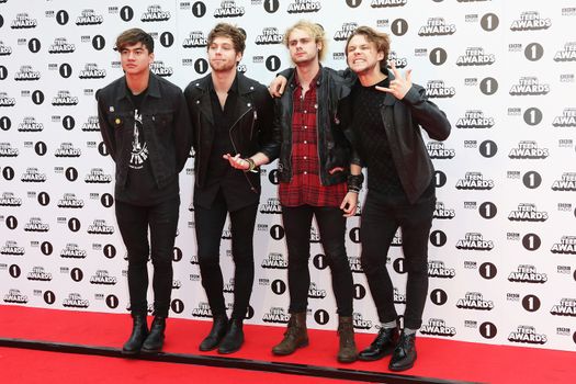 UNITED KINGDOM, London: (From left to right) Calum Hood, Luke Hemmings, Michael Clifford and Ashton Irwin of 5 Seconds of Summer attend BBC Radio 1's Teen Awards at Wembley Arena in London on November 8, 2015. 