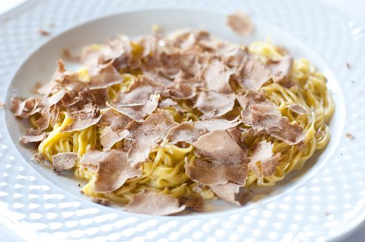 Italian pastas , tajarin , with butter and truffle, piemonte