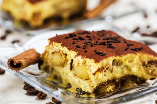 Tiramisu Cake with coffee beans and cinnamon