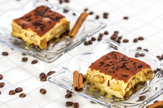 Tiramisu Cake with coffee beans and cinnamon