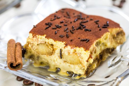 Tiramisu Cake with coffee beans and cinnamon