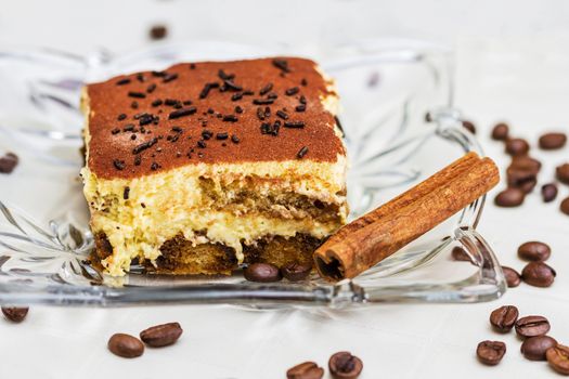 Tiramisu Cake with coffee beans and cinnamon