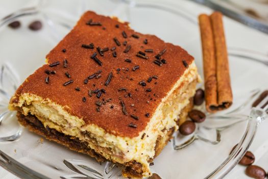 Tiramisu Cake with coffee beans and cinnamon