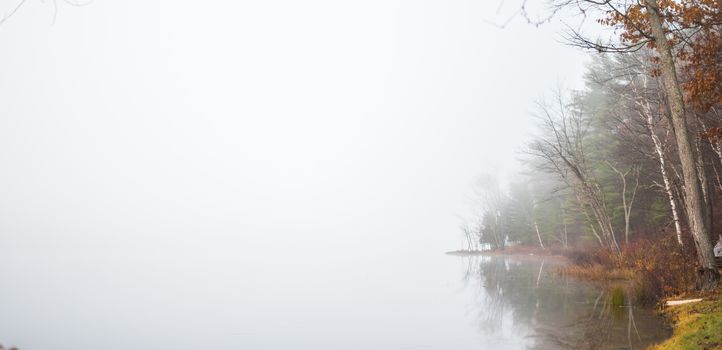 Still, cool air and warm lake water make for an early morning masking of the water in a near opaque fog show.