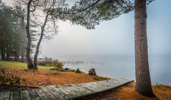 Still, cool air and warm lake water make for an early morning masking of the water in a near opaque fog show.