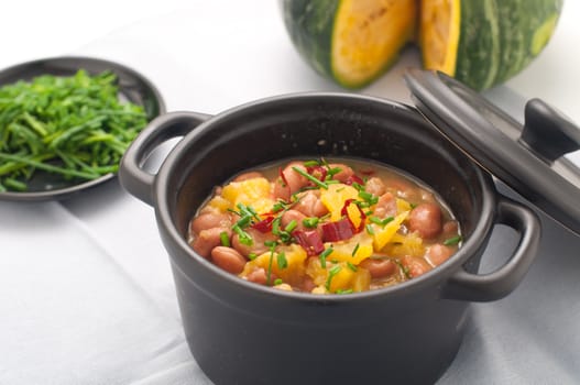 Soup with beans and squash with chilli powder, italy