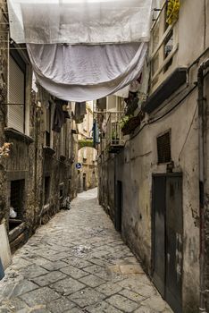 narrow street in downtown the city of Naples, Italy