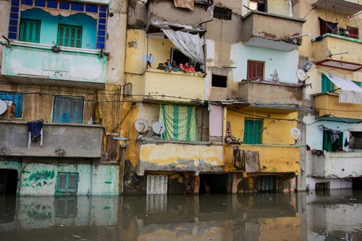 EGYPT, Alexandria: People are seen in the flooding road after a torrential rain caused flood in the Kafr El Arab neigborhood in west of Alexandria, Egypt on November 07, 2015.