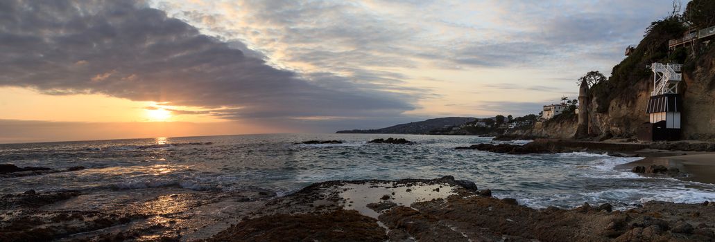 Sunset over the turret tower at Victoria Beach in Laguna Beach, Southern California