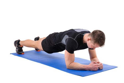 Young man shows Elbow Plank Workout, isolated on white, front view