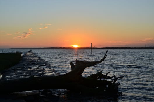 The day is nearly done as the sun set over the ocean in North Carolina