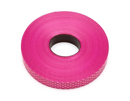 Pink red plastic ribbon on white background