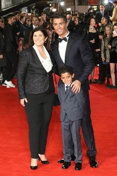 UNITED KINGDOM, London: Cristiano Ronaldo, his mother Maria Dolores Aveiro and son Cristiano Ronaldo Junior attend the world premiere of the documentary Ronaldo at Vue West End cinema at Leicester Square, London on November 9, 2015. 