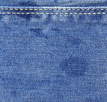 Blue jeans wet denim texture. Vintage background