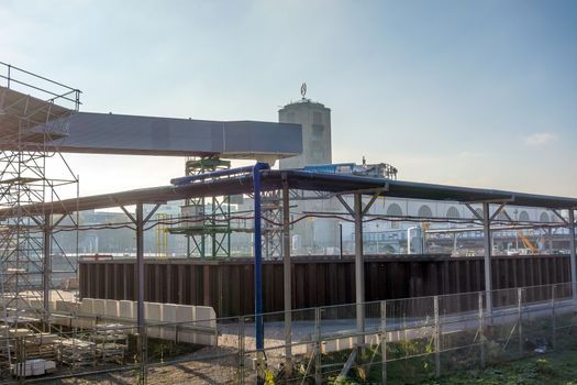 Stuttgart, Germany - November 1, 2013: Construction site Stuttgart 21. View of the water management, old main railway station tower in the background.