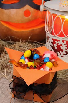 box filled with a variety of sweets on the table for Halloween