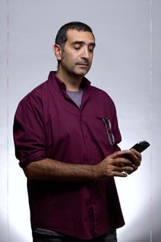 facial expression adult man in purple shirt
